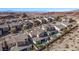 Aerial view of houses and community landscape at 30 Hilltop Crest St, Henderson, NV 89011