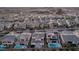 Aerial view of neighborhood with houses and pools at 30 Hilltop Crest St, Henderson, NV 89011