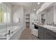 Large bathroom with double vanity and soaking tub at 30 Hilltop Crest St, Henderson, NV 89011