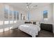 Bright bedroom with white walls, plantation shutters, and stylish decor at 30 Hilltop Crest St, Henderson, NV 89011