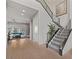 Open and bright foyer featuring a staircase and backyard view at 30 Hilltop Crest St, Henderson, NV 89011