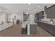 Open concept kitchen with large island and stainless steel appliances at 30 Hilltop Crest St, Henderson, NV 89011