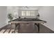 Modern pool table in a well-lit game room at 30 Hilltop Crest St, Henderson, NV 89011