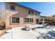 Backyard patio with fountain and seating area at 3107 Lenoir St, Las Vegas, NV 89135