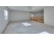 Spacious carpeted bedroom with ceiling fan and multiple windows at 3107 Lenoir St, Las Vegas, NV 89135