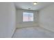 Simple bedroom with neutral walls and carpet at 3107 Lenoir St, Las Vegas, NV 89135
