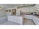 Kitchen with large island, white cabinetry, and open layout at 3107 Lenoir St, Las Vegas, NV 89135