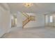 Spacious living room with staircase and hardwood floors at 3107 Lenoir St, Las Vegas, NV 89135
