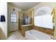 Bathroom boasts a shower, bathtub, and updated tile at 349 Yacht Ave, Henderson, NV 89012