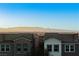 Community view showcasing homes with mountain views at 368 Gracious Way, Henderson, NV 89011