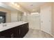 Modern bathroom with double vanity, large shower, and tile flooring at 368 Gracious Way, Henderson, NV 89011