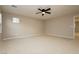 Large bedroom with ceiling fan and carpet flooring at 368 Gracious Way, Henderson, NV 89011