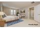 Virtually staged bedroom with desk and window seating at 368 Gracious Way, Henderson, NV 89011