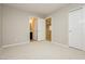 Spacious bedroom with plush carpeting and access to bathroom at 368 Gracious Way, Henderson, NV 89011