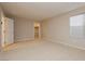 Spacious carpeted bedroom with large window and walk-in closet at 368 Gracious Way, Henderson, NV 89011