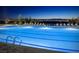 Night view of lighted community lap pool at 368 Gracious Way, Henderson, NV 89011