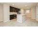 Modern kitchen with island and stainless steel appliances at 368 Gracious Way, Henderson, NV 89011
