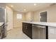 Kitchen island with sink, dishwasher and stainless steel appliances at 368 Gracious Way, Henderson, NV 89011