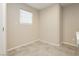 Bright laundry room with tile flooring and window at 368 Gracious Way, Henderson, NV 89011