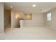 Loft area with neutral carpeting and overhead lighting at 368 Gracious Way, Henderson, NV 89011