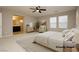 Virtually staged main bedroom with ensuite bathroom access at 368 Gracious Way, Henderson, NV 89011