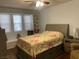 Bedroom with a queen bed and window seat at 3940 Edgemoor Way, Las Vegas, NV 89121