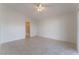 Bright bedroom with tile flooring and ceiling fan at 402 Dune Ridge Ave, North Las Vegas, NV 89031