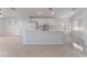 Spacious kitchen with white cabinets and an island at 402 Dune Ridge Ave, North Las Vegas, NV 89031