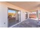 Covered patio with sliding glass doors at 402 Dune Ridge Ave, North Las Vegas, NV 89031
