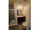 Bathroom with shower, granite vanity, and toilet at 4965 Indian River Dr # 103, Las Vegas, NV 89103