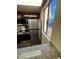 Stainless steel refrigerator and oven in kitchen at 4965 Indian River Dr # 103, Las Vegas, NV 89103