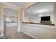 Bright and spacious entryway with views into the living room and kitchen at 5500 Santovito St, Pahrump, NV 89061