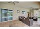 Covered patio with seating area and adjacent pool access at 5500 Santovito St, Pahrump, NV 89061