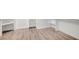 Large walk-in closet with light wood-look flooring and ample shelving at 5500 Santovito St, Pahrump, NV 89061