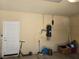 Garage with storage, central vacuum system, and extra space at 6538 Creekside Cellars Ct, Las Vegas, NV 89139