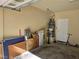 Garage with water heater, storage, and extra space at 6538 Creekside Cellars Ct, Las Vegas, NV 89139