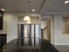 Kitchen with stainless steel refrigerator and granite countertop island at 6538 Creekside Cellars Ct, Las Vegas, NV 89139