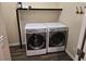 Laundry room with washer and dryer and additional shelving at 6538 Creekside Cellars Ct, Las Vegas, NV 89139