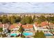 Scenic aerial perspective of a well-planned residential area with private pools and meticulous landscaping at 7909 Rio Rico Dr, Las Vegas, NV 89113