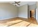 Bright empty bedroom with a vaulted ceiling, and an ensuite bathroom with a walk-in closet at 7909 Rio Rico Dr, Las Vegas, NV 89113