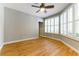 A spacious bedroom featuring hardwood floors and plantation shutters for natural light at 7909 Rio Rico Dr, Las Vegas, NV 89113