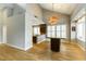 Open dining area featuring a stylish light fixture at 7909 Rio Rico Dr, Las Vegas, NV 89113