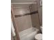 Bathroom with shower/tub combo and toilet at 7964 Rim Rock Way # 102, Las Vegas, NV 89128