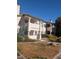 Building exterior with stairs and landscaping at 7964 Rim Rock Way # 102, Las Vegas, NV 89128