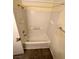 View of tiled tub and shower with white fixtures at 8834 Duncan Barrel Ave # 103, Las Vegas, NV 89178