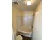 Bright bathroom with tub and shower combination at 8834 Duncan Barrel Ave # 103, Las Vegas, NV 89178