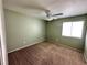 Cozy bedroom with natural light and ceiling fan at 8834 Duncan Barrel Ave # 103, Las Vegas, NV 89178