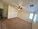 Bedroom features a ceiling fan, window and neutral color at 8834 Duncan Barrel Ave # 103, Las Vegas, NV 89178