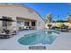 The backyard pool is surrounded by lounge chairs and an outdoor seating area at 9632 Cherry Canyon Ave, Las Vegas, NV 89129