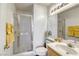 Clean bathroom with a shower, toilet and single vanity at 10016 Diving Duck Ave, Las Vegas, NV 89117